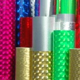 Holographic self-adhesive film