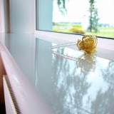 Self-adhesive film for window sills