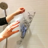 Self-adhesive film on tiles