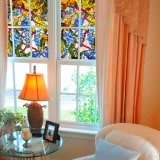 Self-adhesive film for glass